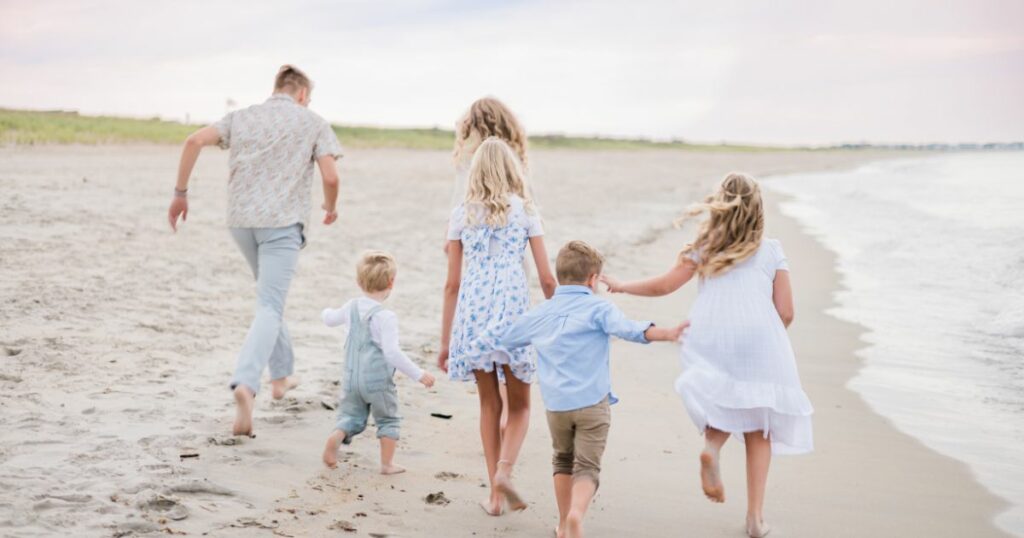 creative beach family photo poses - Massachusetts Family Photographer